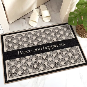 Close-up of non-slip entryway mat with wavy pattern and Peace and happiness text