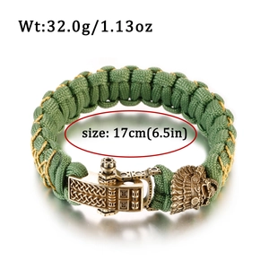 Detail of military green paracord bracelet with skull chief buckle showing 17cm length