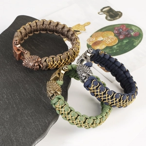 Handmade woven paracord bracelet with metal skull tribal chief charm and U-shackle clasp