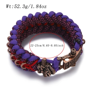 Detail of paracord woven bracelet with bronze dragon buckle and product dimensions
