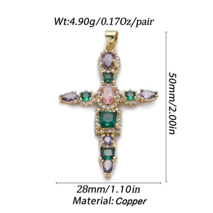 Detailed view of gold-plated copper cross pendant with colorful zircon stones