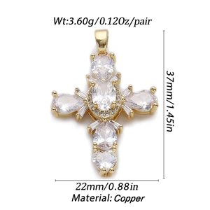 Detailed view of copper cross pendant showing 37mm height and clear crystal inlays