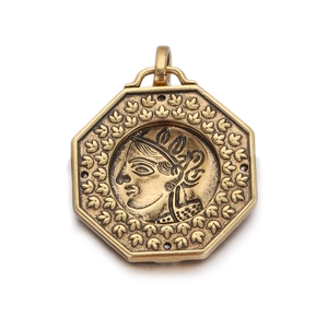 Detailed close-up of octagonal vintage gold coin pendant featuring Greek goddess relief