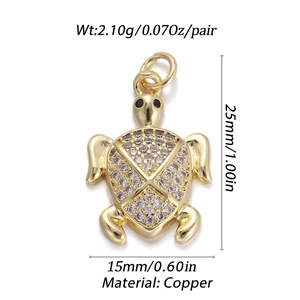 Golden turtle pendant with sparkling cubic zirconia, made of copper with measurement details