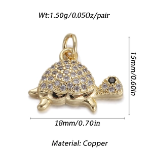 Detail of 15x18mm golden turtle pendant with micro-set cubic zirconia and black stone eyes