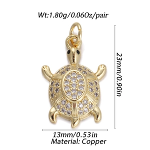 Detailed view of turtle pendant with white cubic zirconia and copper dimensions