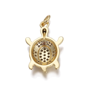 Detailed back view of gold turtle pendant showing hollow micro-pave setting holes