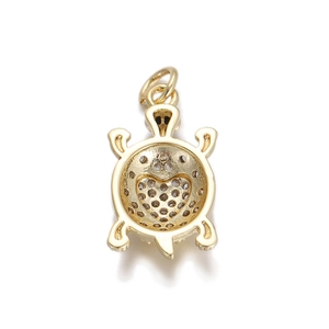 Detail showing hollow heart pattern and precision craft on turtle pendant back