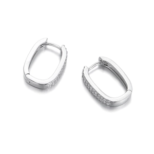 Macro detail of silver rectangular hoop earrings featuring micro-pave crystal setting