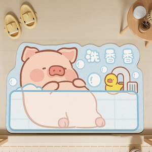 Detail of cute pig cartoon bath mat in soft blue with absorbent water fibers