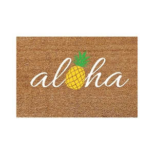 Natural coir doormat featuring aloha text and a pineapple graphic on a brown background