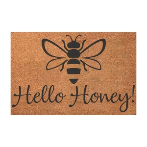 Close-up of Hello Honey cartoon bee mat with durable fiber texture and brown finish