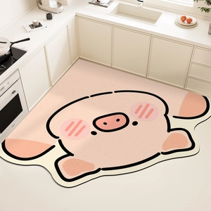 Macro detail of cartoon pig diatom mud kitchen mat with non-slip texture and pink finish