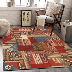 Detailed weave of geometric patchwork area rug in vintage bohemian style for bedroom