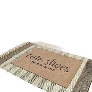 Modern diatom mud door mat with 'cute shoes TAKE THEM OFF' text and tassel base