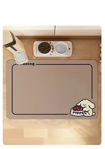 Detail of non-slip pet feeding mat with puppy illustration on wooden floor