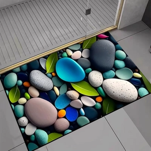 Detail der 3D-Kieselstein-Badematte mit lebendigen Farben und saugfähiger Textur