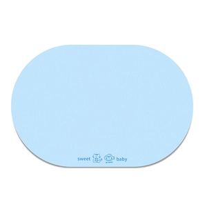Detail of light blue oval pet mat with non-slip texture and cute cartoon cat printing