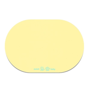 Close-up of yellow oval pet feeding mat with sweet baby text and cartoon cat icon