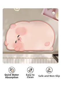 Close-up of pink pig diatom mud mat highlighting water absorption and anti-slip texture