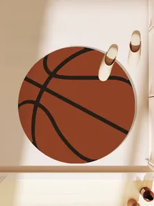 Detailed view of round basketball patterned bath mat with water absorbent material