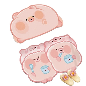Cartoon pink pig diatom mud bathroom mat set with yellow floral slippers on white background