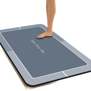 Absorbent diatom mud bath mat with Enjoy Every Day print and non-slip backing