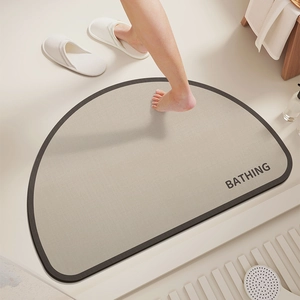 Semi-circle diatom mud bath mat with BATHING text and non-slip backing for bathrooms