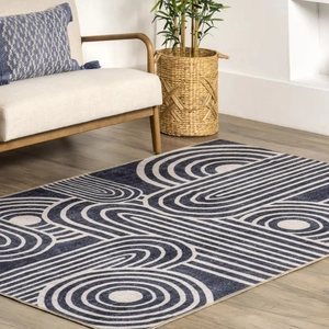 Modern geometric area rug with navy blue and beige patterns for living room decor