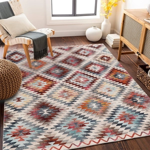 Detail of Bohemian geometric rug showing intricate woven texture and vibrant ethnic patterns