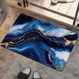Detail of luxury marble pattern bath mat with blue tones and golden foil accents