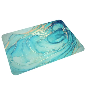 Absorbent diatom mud bath mat featuring a luxury blue marble pattern with gold veins