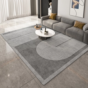 Modern minimalist dark grey area rug with white geometric circular patterns for living room