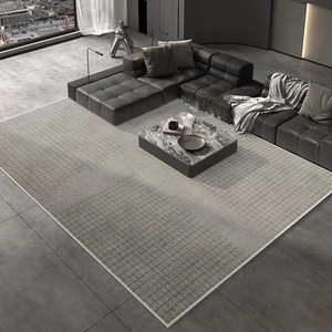 Detail of grey gradient grid texture and neat white stitching on modern plush carpet