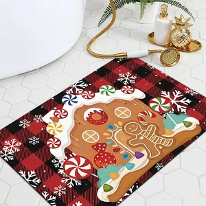 Christmas buffalo plaid bath mat featuring gingerbread houses and sweets on white tiles