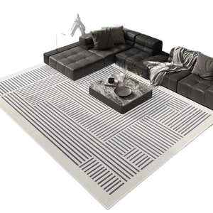 Modern minimalist geometric area rug with gray patterns on cream base for living rooms