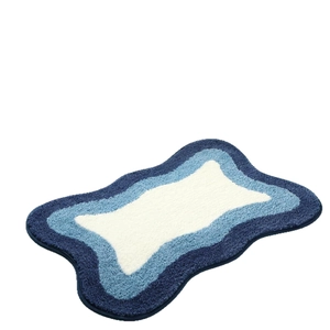 Modern minimalist irregular wave rug with blue gradient faux cashmere plush texture