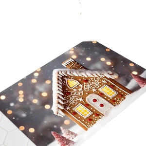 Absorbent diatomite Christmas bath mat with gingerbread house design and festive light spots
