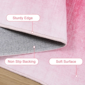 Modern pink abstract rug with non-slip backing, sturdy edges and soft surface texture