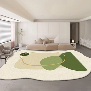 Detailed close-up of irregular faux cashmere rug with green abstract geometric patterns