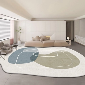 Detailed view of the irregular wave edges and abstract geometric patterns on the area rug