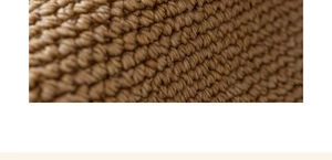 Macro shot of durable coffee brown sisal-style woven texture with high density fibers