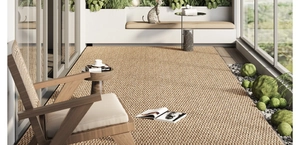 Detail of cross-woven sisal rug showing high-density fiber texture and non-slip edge