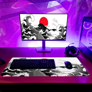 Detail of Great Wave ukiyo-e mouse pad with stitched edges and purple backlit setup