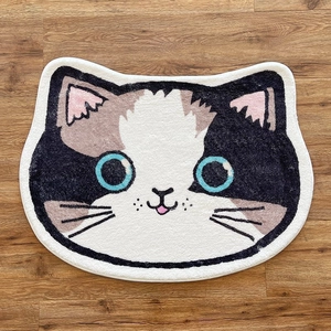 Tapis mignon en forme de chat en cachemire synthétique sur sol en bois