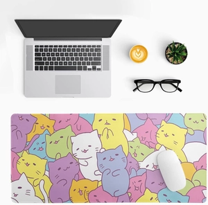 Close-up of cute cartoon cat desk mat with reinforced edges and non-slip rubber base