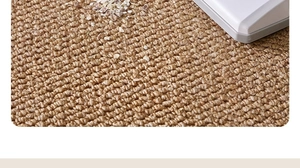 Macro shot of high-density sisal rug texture with vacuum cleaner demonstrating easy cleaning