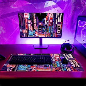 Extra wide pixel art mouse pad with Japanese city street scene and cyberpunk neon design
