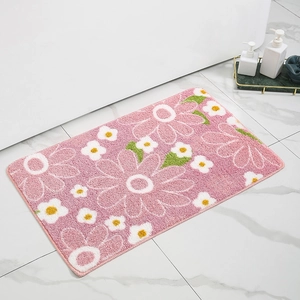 Pink daisy floral bath mat in soft faux cashmere with non-slip backing for bathrooms