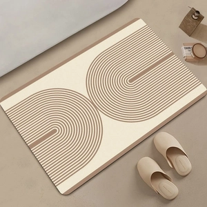 Japanese Wabi-Sabi diatom mud bath mat with minimalist brown geometric arcs on cream base